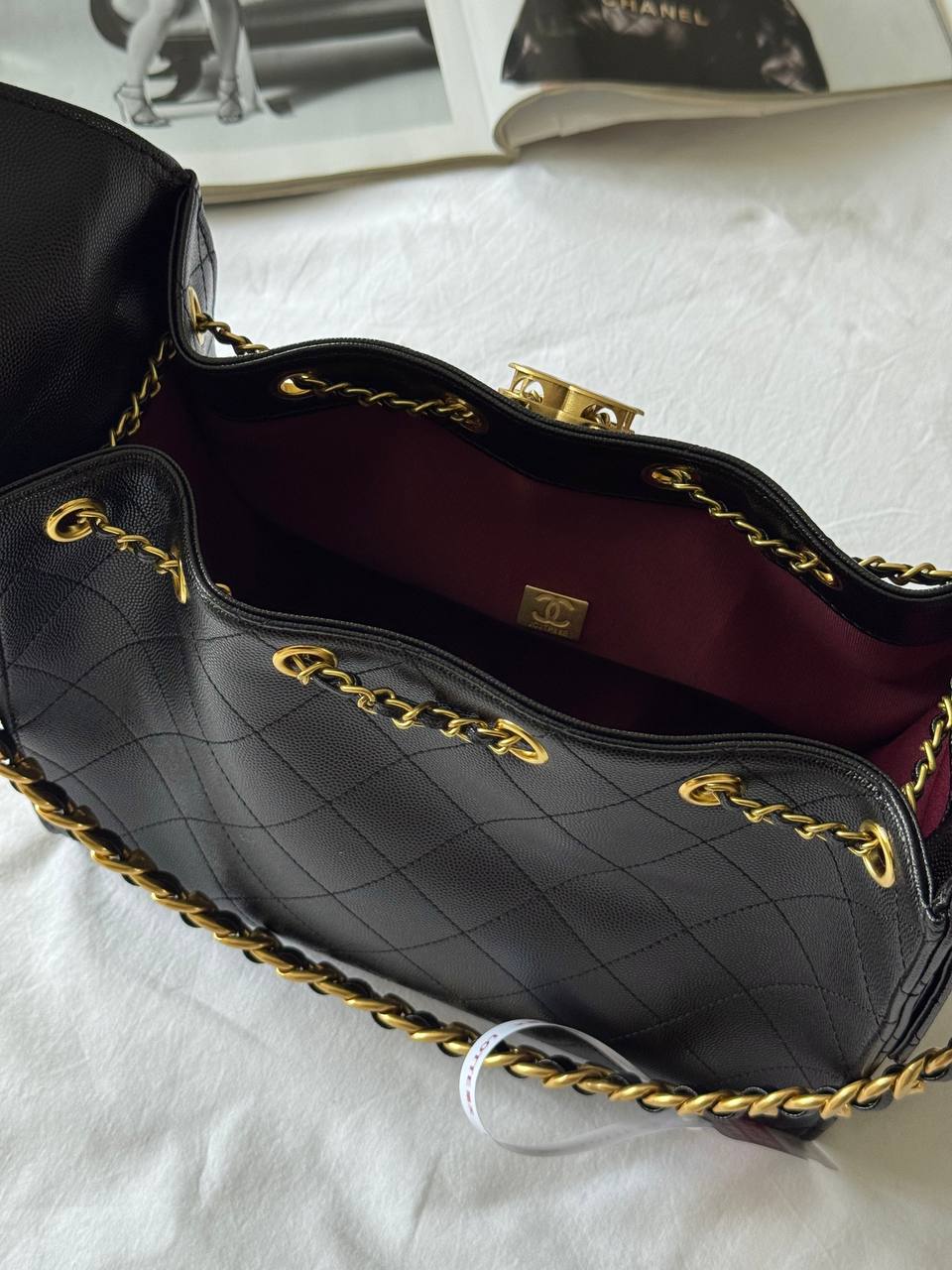 Chanel 25 Handbag in Black With Gold Hardware - 16