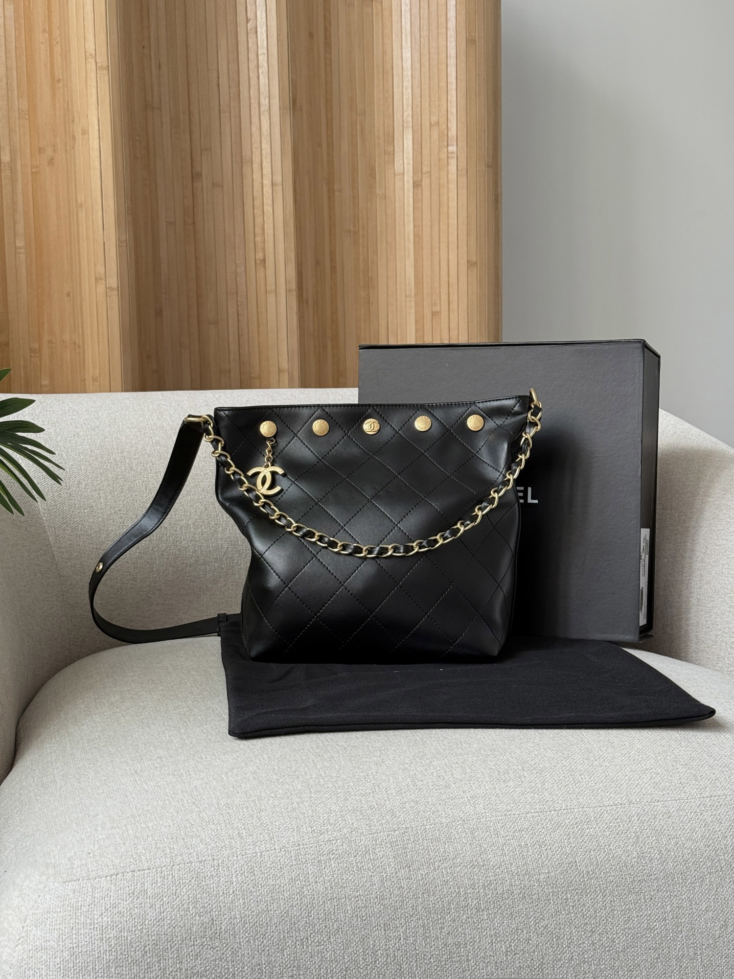 Chanel Quilted Drawstring Bag in Black/Gold - 8