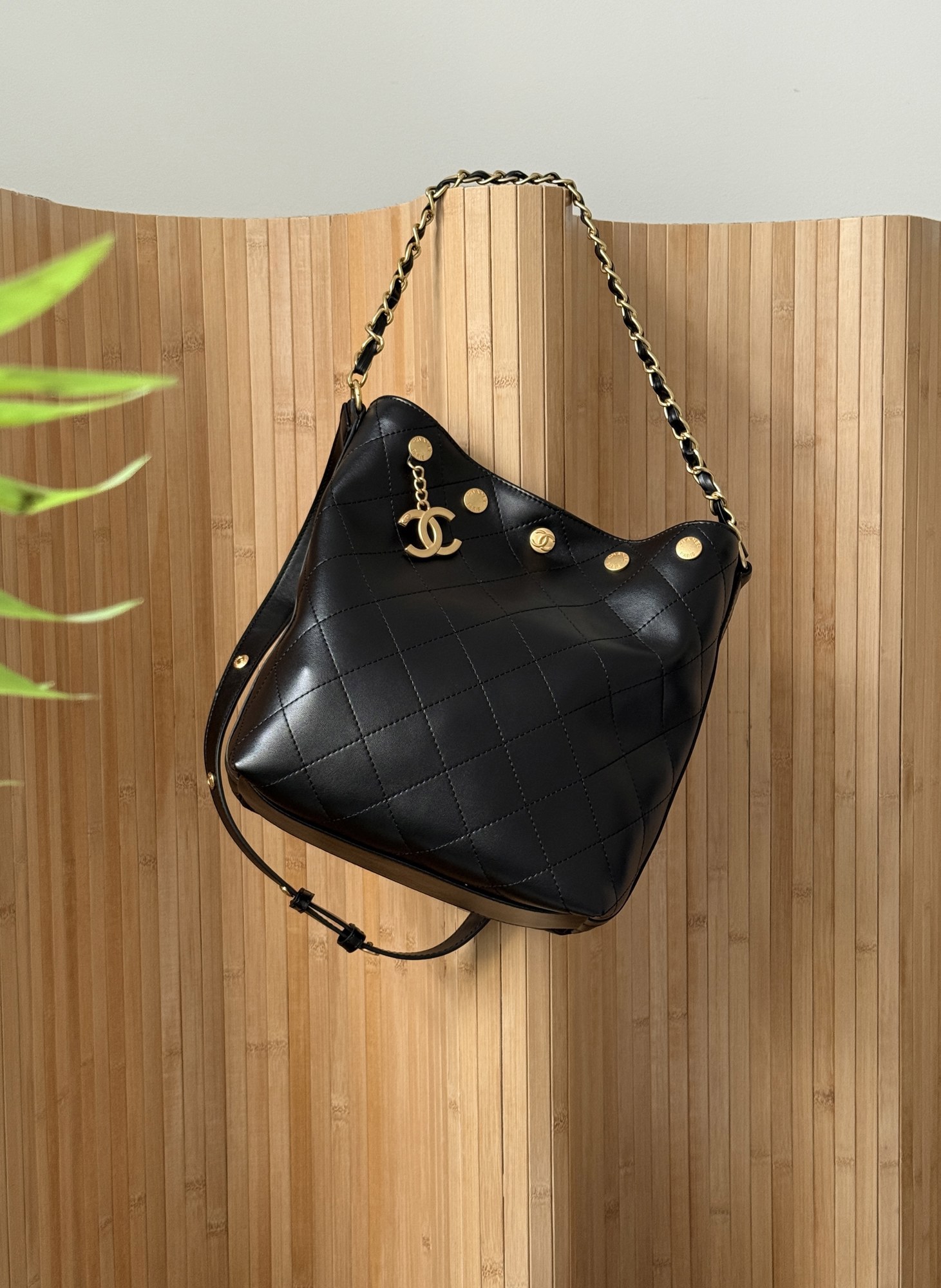 Chanel Quilted Drawstring Bag in Black/Gold - 12