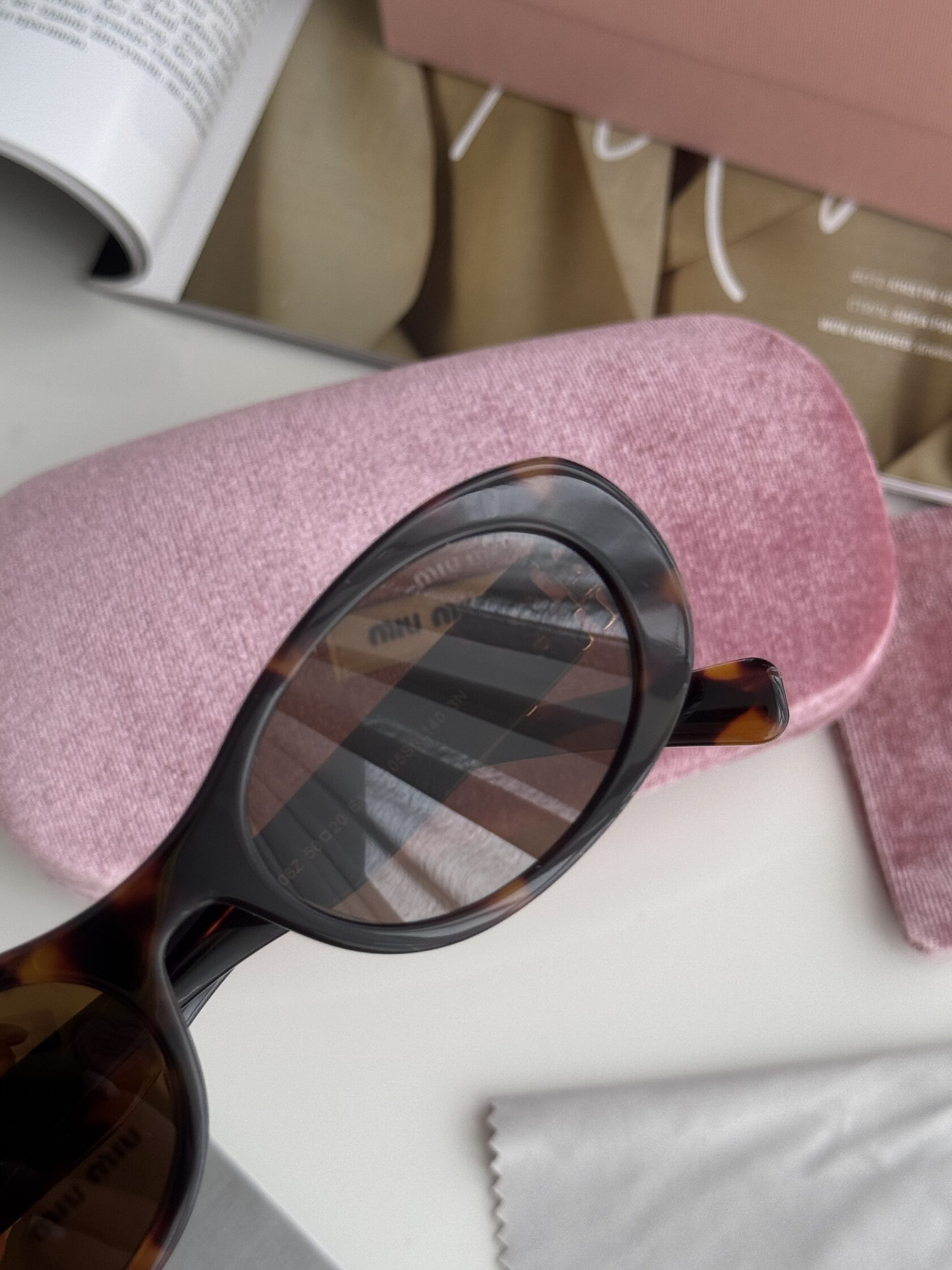 Miu Miu Leo/Gold SMU 06Z E142-F05S0 3N - 6