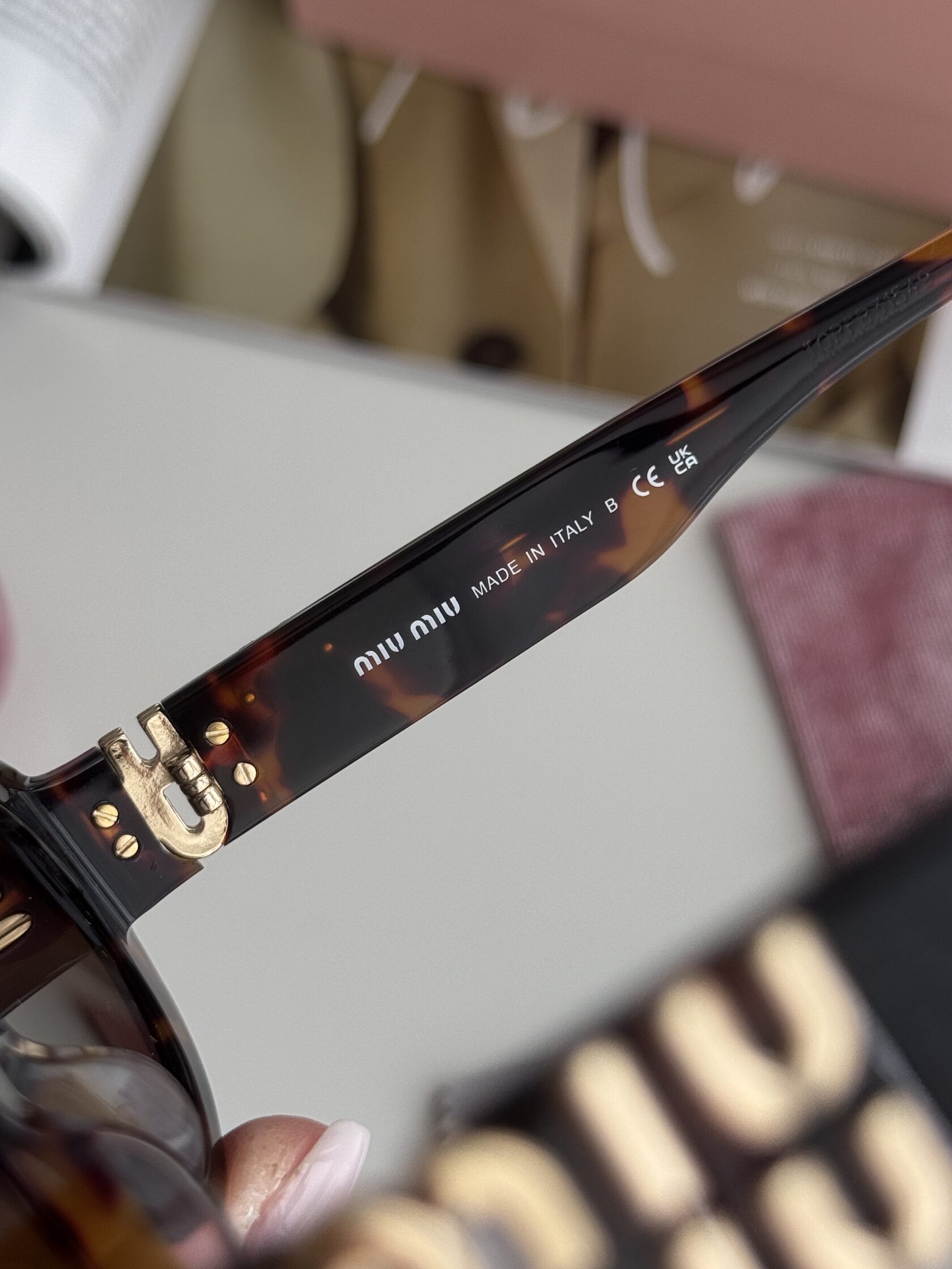 Miu Miu Leo/Gold SMU 06Z E142-F05S0 3N - 7